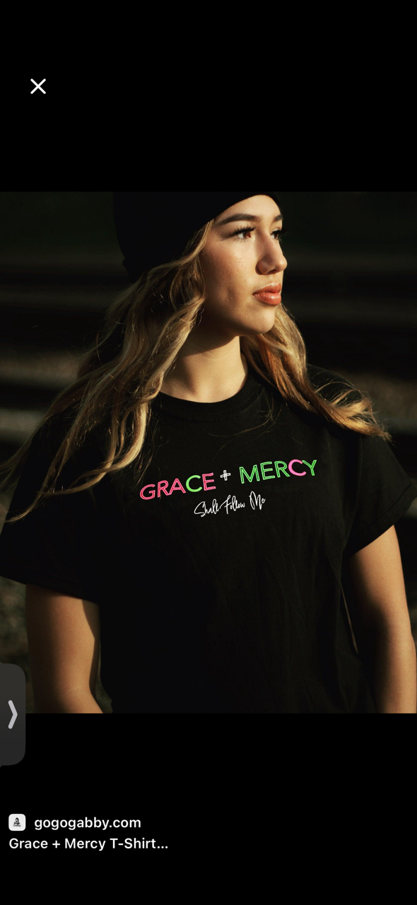 White unisex Christian t-shirt with 'I Am A Product Of Mercy' faith-based design flat-lay - Mercy & Grace Apparel